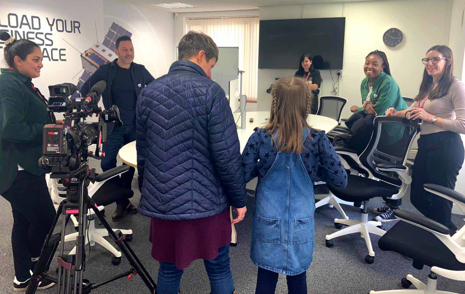 Bethany with her mum, the Blue Peter film crew and Steve from Crux Design Agency at In-Space Missions.