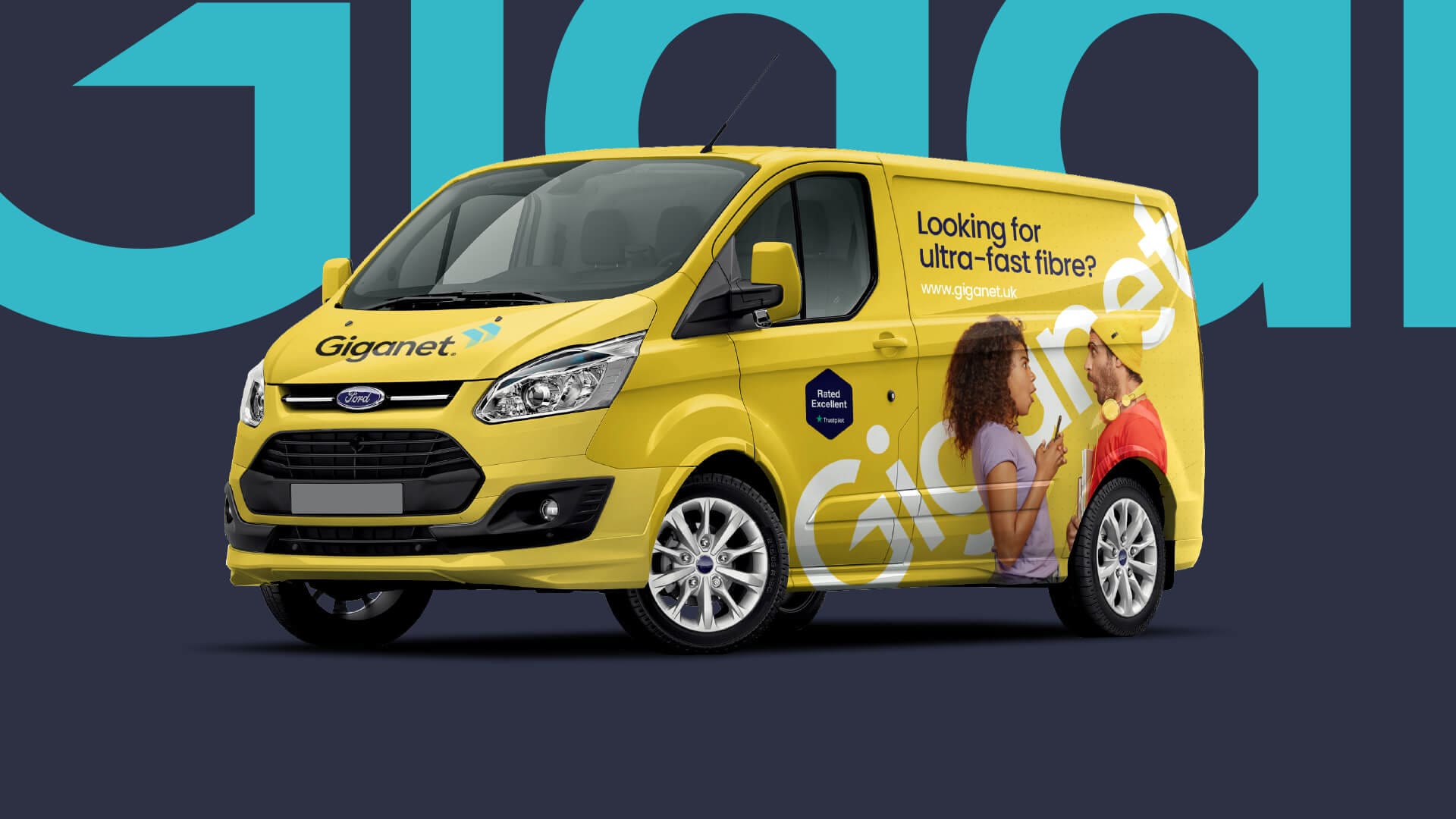 A yellow ford transit van displaying the vehicle, car branding for full fibre provider Giganet